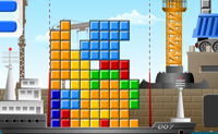 Speel Tetris in de haven, en probeer de blokken die via deze hijskraan omlaag zakken, zo compact mogelijk op het schip te laden.