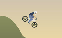 Probeer om met je BMX-Fiets over de bergen heen te komen en backflips te maken.