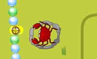 Probeer de parelketting weg te spelen voordat de eerste parel bij de schelp is. Je speelt parels weg door 3 parels van dezelfde kleur achter elkaar te krijgen.